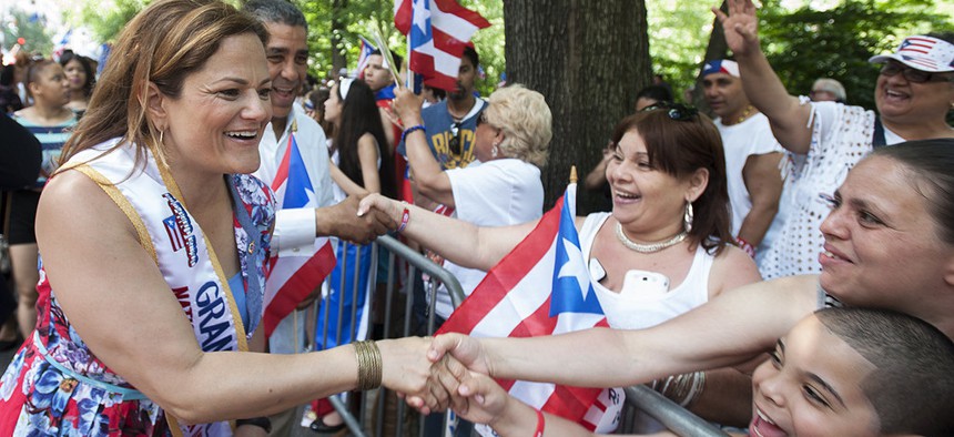 Then-New York City Council Speaker Melissa Mark-Viverito greets onlookers at the Puerto Rican Day Parade in 2014.