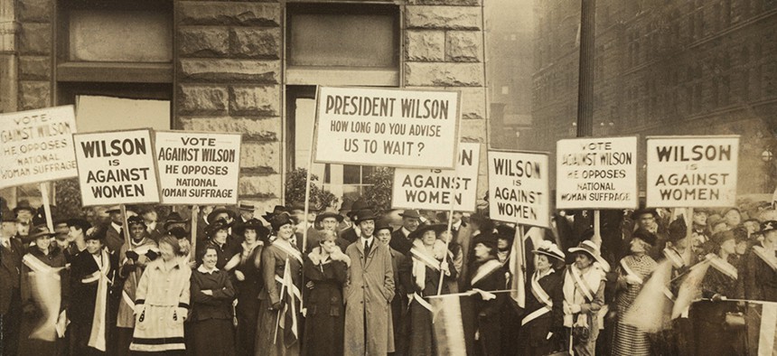 Crowd of women's suffrage supporters demonstrating in Chicago on October 20, 1916. Woodrow Wilson withheld his support for Votes of Women until 1918.