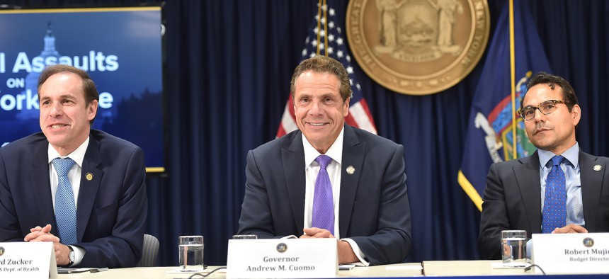 Gov. Andrew Cuomo with Health Commissioner Howard Zucker and Budget Director Robert Mujica