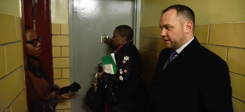 New York City Council Speaker Corey Johnson touring a NYCHA development in April. 