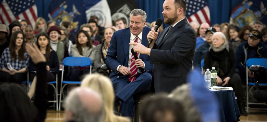 New York City Mayor Bill de Blasio at a town hall with Council Speaker Corey Johnson.