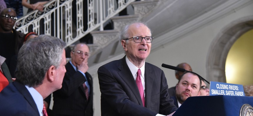 Former Judge Jonathan Lippman gives remarks during a press conference.