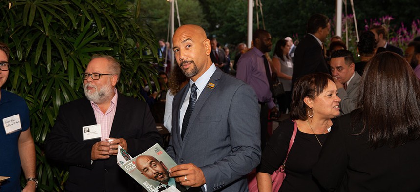 Bronx Borough President Ruben Diaz Jr. (#2) reading the Bronx Power 100 edition of City & State Magazine.