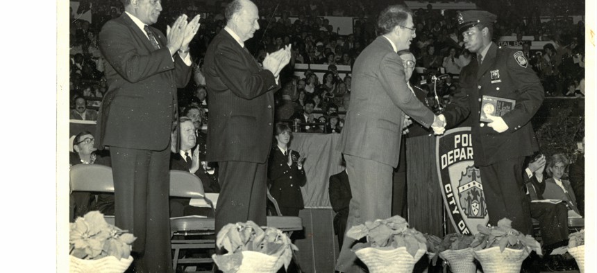 Eric Adams graduating from the police academy in 1984.