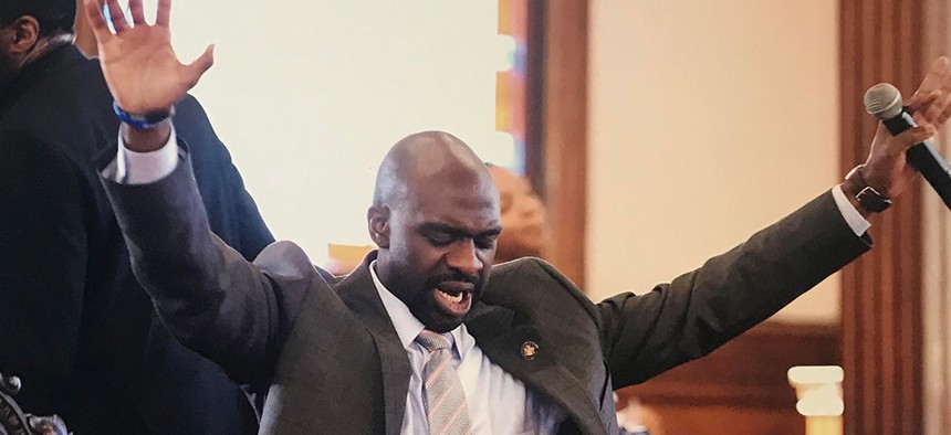 New York Assemblyman Michael Blake preaching.