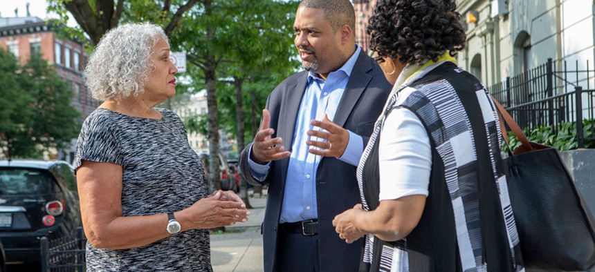 New York Law professor Alvin Bragg speaking with supporters.