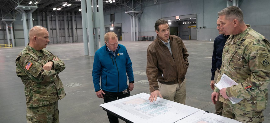 Cuomo discusses coronavirus combat plans with Colonel Thomas Asbury, Major General Patrick Murphy, and Major General Raymond Shields. 