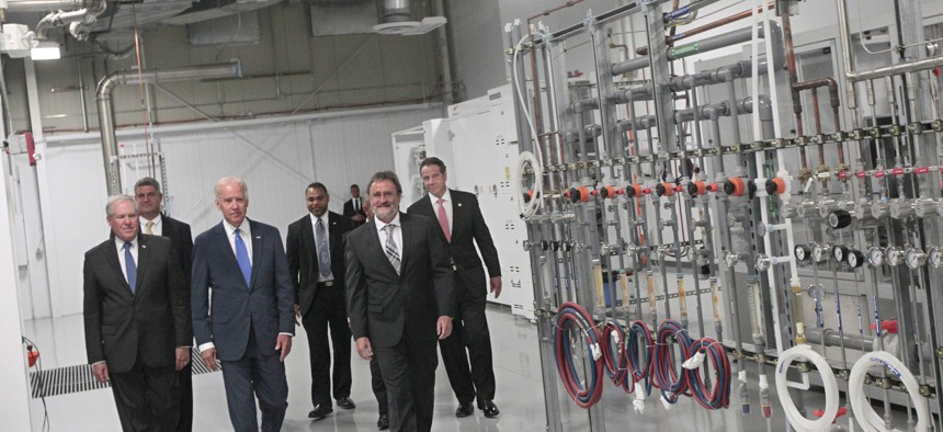 Former Vice President Joe Biden and Gov. Andrew Cuomo tour SUNY Poly during the announcement that the federal government would join the state in funding the American Institute for Manufacturing Integrated Photonics in Rochester in 2015.