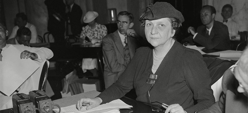 Former Secretary of Labor Frances Perkins testifying to Congress for the wage-and-hour bill, to eliminate sweatshop conditions, in June, 1937.