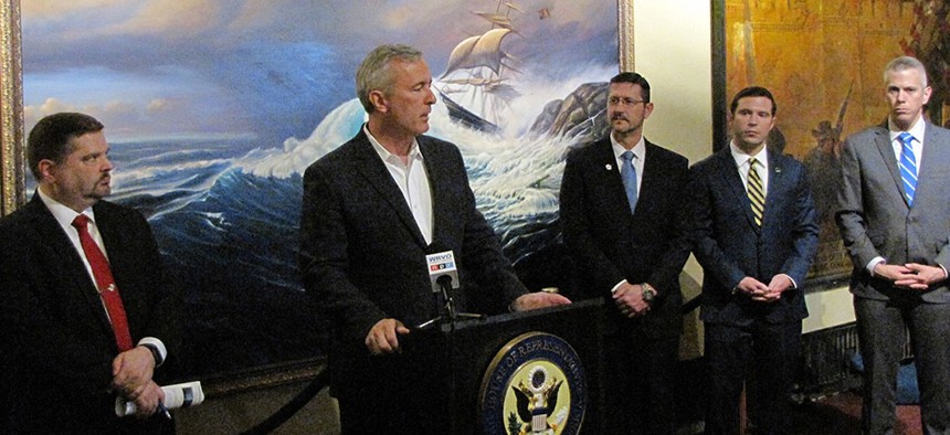 John Katko (speaking) and Anthony Brindisi (far right).