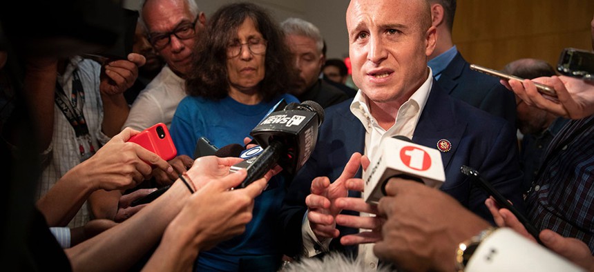 Rep. Max Rose speaks to reports after a town hall meeting in October.