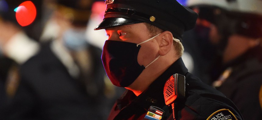 An NYPD police officer on the street near the Stonewall Inn on November 5, 2020.