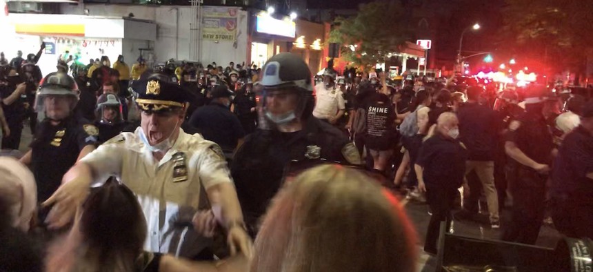 The NYPD reacting to a crowd of protestors during the anti-policy brutality protests in New York City.