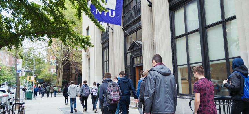 College students walking to class at NYU in 2017.