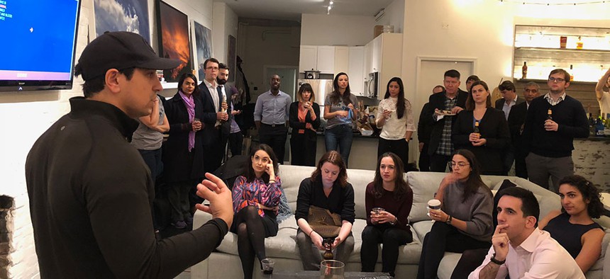 Gupta speaks at a Manhattan meetup of The Arena, including then-Congressional candidate Alexandria Ocasio-Cortez, in November 2017.