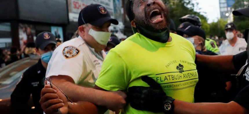 State Senator Zellnor Myrie restrained and pepper-sprayed by NYPD officers at Barclays Center on May 29th.