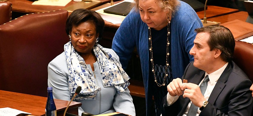 New York Senate Majority Leader Andrea Stewart-Cousins, Sen. Liz Krueger and Sen. Michael Gianaris listen as Senate members speak in favor of legislation to change state legal standards on sexual harassment in Albany.