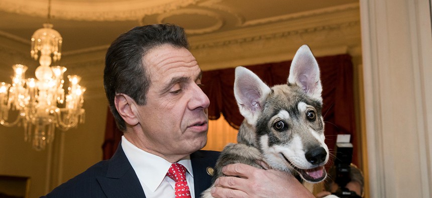 Gov. Andrew Cuomo with his dog Captain.