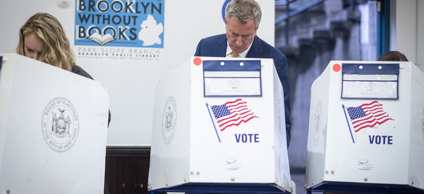 New York City Mayor Bill de Blasio votes in the 2018 general election at the Park Slope Library in Brooklyn. 