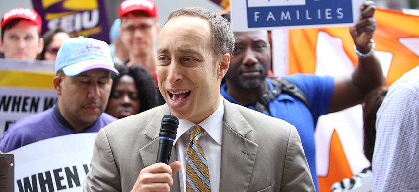 New York State WFP director Bill Lipton at a rally in 2015 to urge the New York Wage Board to seek a $15 per hour minimum wage.