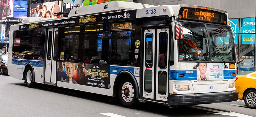 A New York City bus in motion.