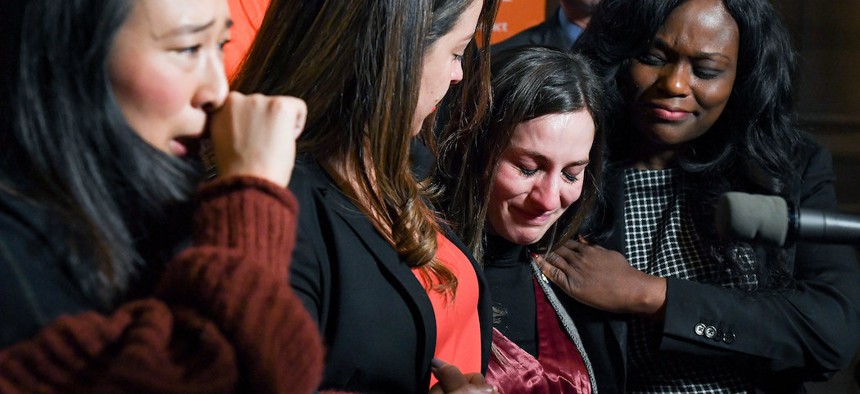 New York State Senator Alessandra Biaggi cries during a press conference marking the one year anniversary of the Child Victims Act.