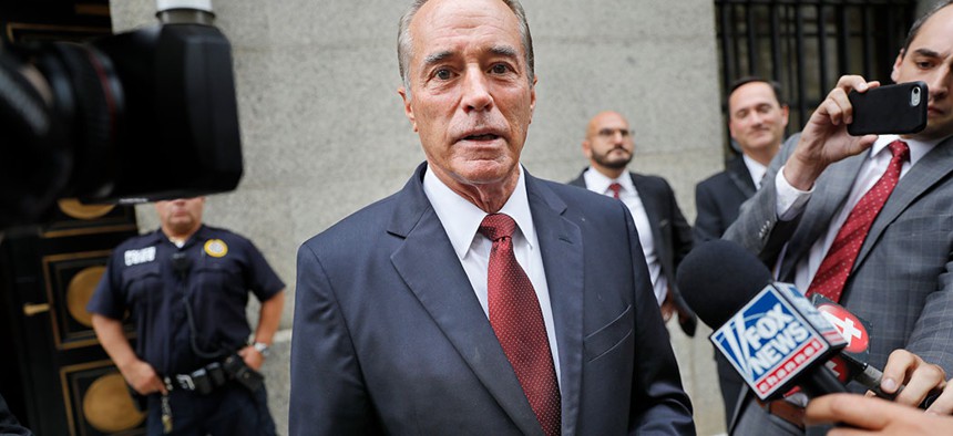 U.S. Rep. Chris Collins, speaks to reporters as he leaves the courthouse following a pretrial hearing in his insider-trading case on September 12.