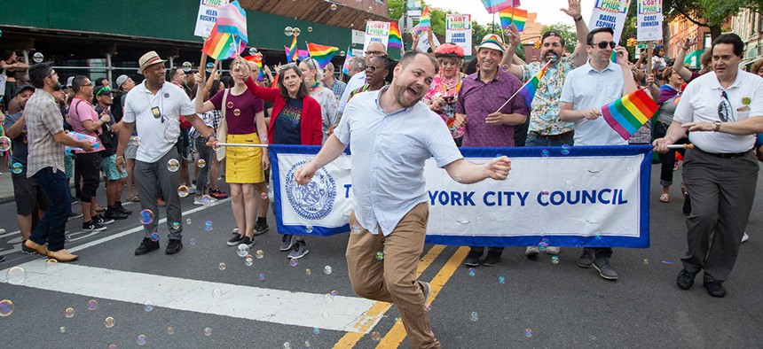 New York City Council Speaker Corey Johnson living his best life marching in Brooklyn's Pride parade.