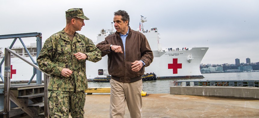Governor Andrew Cuomo with Rear Admiral John Mustin welcome the United States Naval Hospital Ship Comfort to New York City.