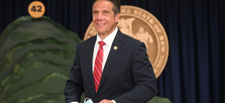 Governor Cuomo with coronavirus mountain, which he appears to believe he has conquered.