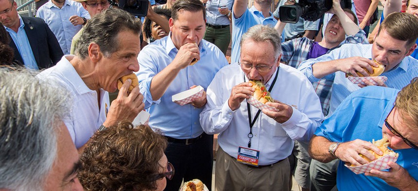 Gov. Andrew Cuomo and company chowing down on some Gianelli sausage.