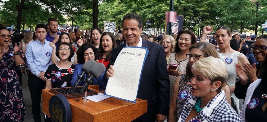 Gov. Andrew Cuomo signing legislature that expands equal pay laws proceeding the start of the New York City ticker tape parade celebrating the U.S. women’s soccer team’s World Cup victory.