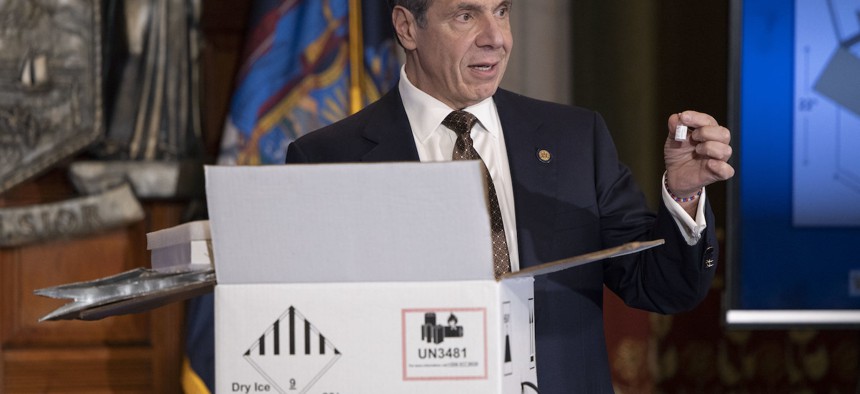 Governor Cuomo with mock vaccines.