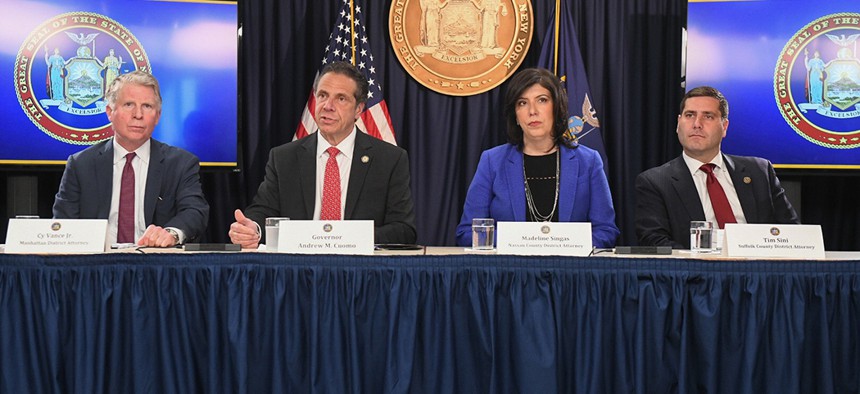 Manhattan District Attorney Cyrus Vance Gov. Andrew Cuomo, Nassau County District Attorney Madeline Singas and Suffolk County District Attorney Timothy Sini.