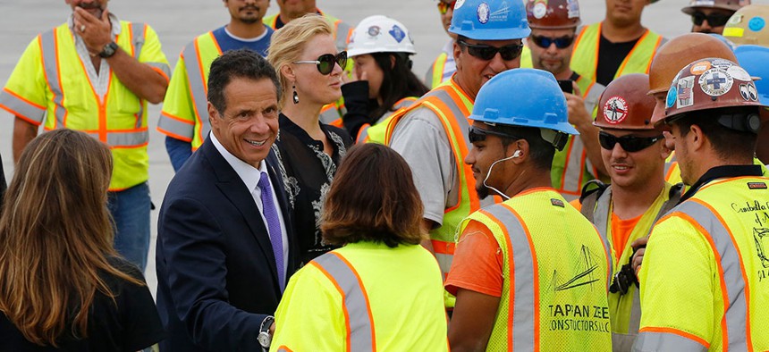 Gov. Andrew Cuomo meets with construction workers during the official opening of the Gov. Mario M. Cuomo Bridge in 2018.