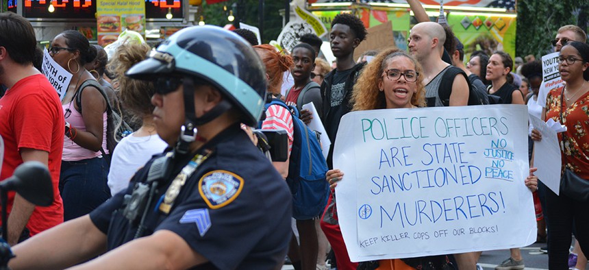 People protesting on July 17, the anniversary of the death of Eric Garner, in Lower Manhattan.