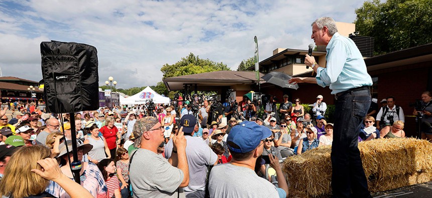 New York City Mayor Bill de Blasio speaks at the Des Moines Register Soapbox during his visit to the Iowa State Fair.