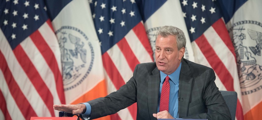 New York City Mayor Bill de Blasio announced that 495 City Hall employees, including him, will be furloughed for five days as of Oct. 1.