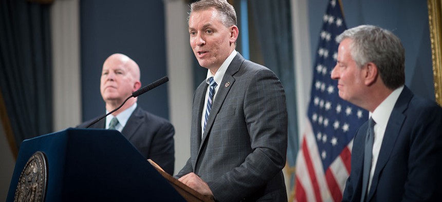 New York City Mayor Bill de Blasio (right) announced that Dermot Shea (center) will be the next Commissioner of the New York Police Department, replacing James O'Neill (left).