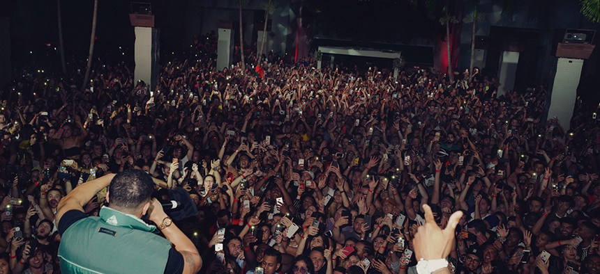 Drake performing during a surprise Day Party at Brooklyn Mirage in August.