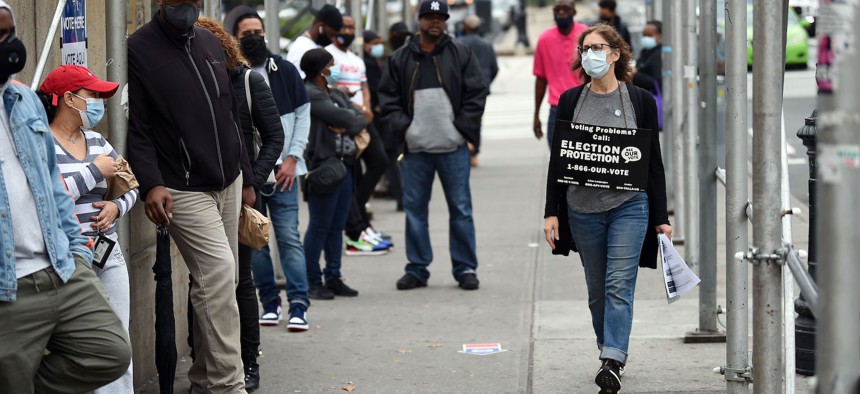 New Yorkers line up for early voting on October 24th.