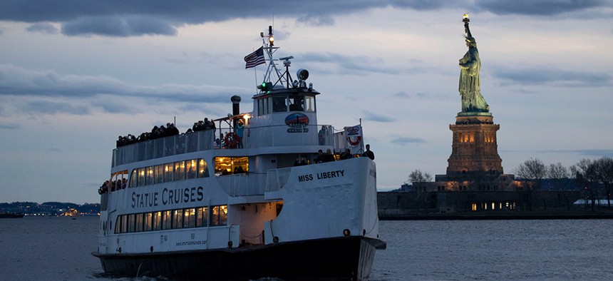 A shuttle boat carries attendees to Ellis Island for Gov. Andrew Cuomo's swearing-in for a third term.