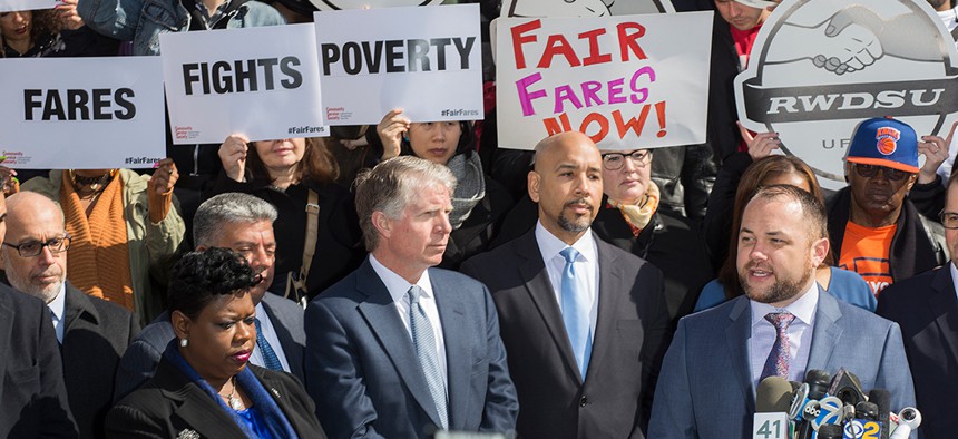 Speaker Corey Johnson and New York City Council Members attend a Fair Fares rally on the steps of New York City Hall.