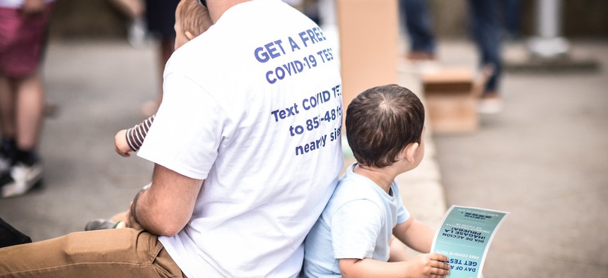 A family in Bedstuy during the NYC get tested day of action on July 8th.