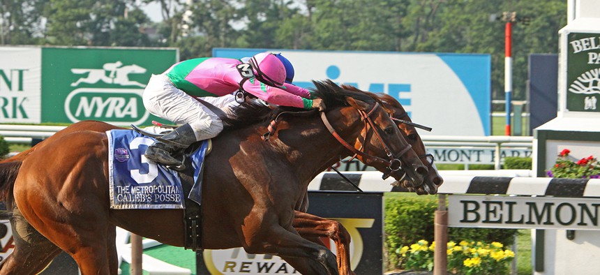 Horses racing at Belmont Race Track. 