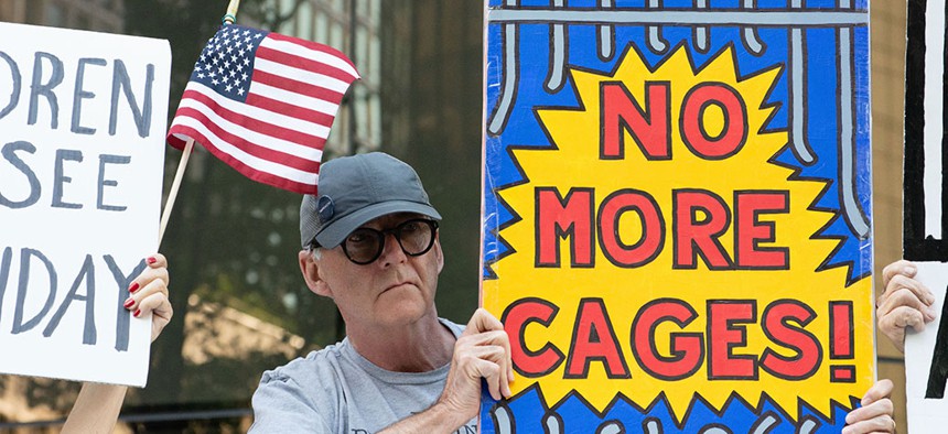 A protest at Trump International Hotel condemning the separation of migrant children from their families on June 14.