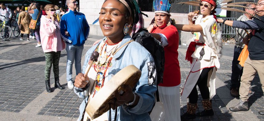 People from New York's Indigenous nations gather at Columbus Circle to call for its renaming and honor Indigenous peoples in the Americans in 2019.