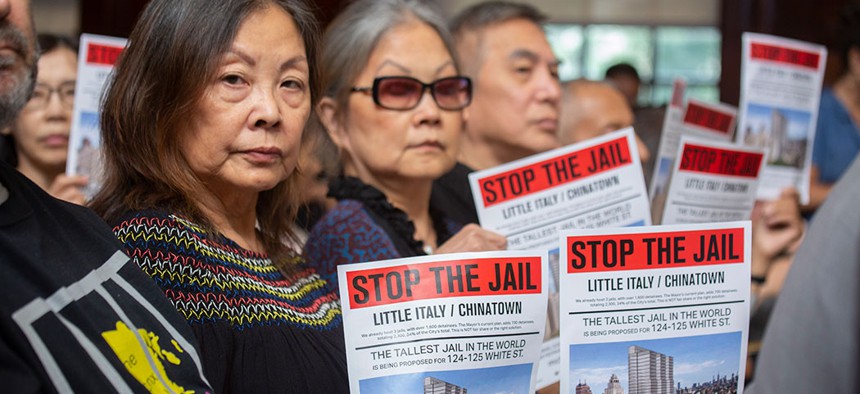 Protesters opposed to the creation of new borough-based jails.