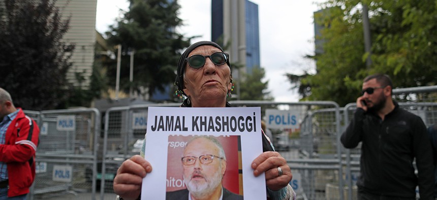 Members of the Turkish Human Rights Association hold pictures of missing Saudi Arabian journalist Jamal Khashoggi during a demonstration in front of the Saudi Arabian consulate in Istanbul, Turkey, 09 October 2018