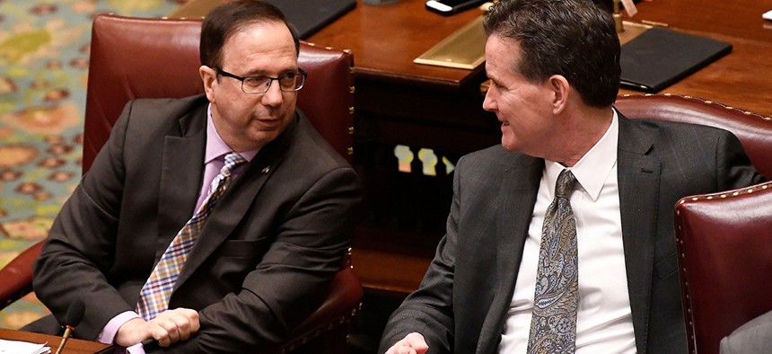 Senate Deputy Minority Leader Joseph Griffo talks with Senate Minority Leader John Flanagan in the Senate Chamber at the state Capitol.